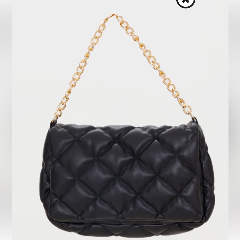 Black oversized quilted gold chain bag